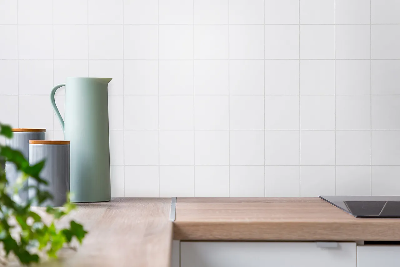 Kjøkkenplate hvit snø 10x10hvit snø 120x60 2,20 pla0,72m2 null - null - 2 - Miniatyr